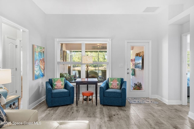 439 Briarcliff Cir, Sebastian, FL 32958 - sitting room with wood finished floors and baseboards