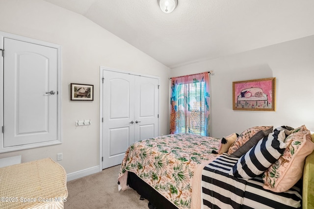 439 Briarcliff Cir, Sebastian, FL 32958 - bedroom featuring lofted ceiling, light carpet, a closet, and baseboards