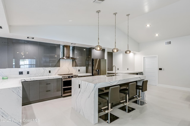 100 Martesia Way, Indian Harbour Beach, FL 32937 - kitchen featuring modern cabinets, stainless steel appliances, wall chimney range hood, a sink, and gray cabinetry
