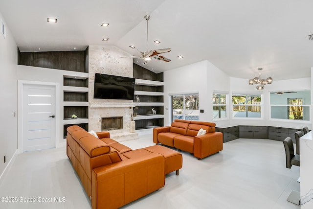 100 Martesia Way, Indian Harbour Beach, FL 32937 - living room featuring built in features, high vaulted ceiling, a chandelier, baseboards, and a fireplace