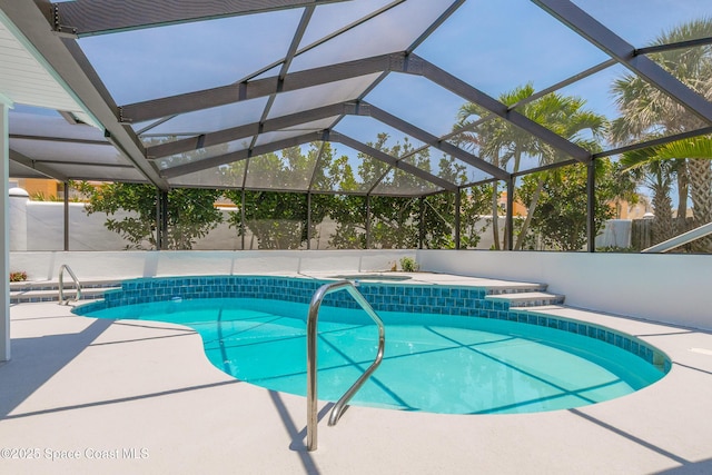 100 Martesia Way, Indian Harbour Beach, FL 32937 - view of pool featuring a patio, a lanai, and a pool with connected hot tub