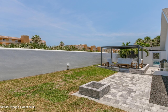 100 Martesia Way, Indian Harbour Beach, FL 32937 - view of yard featuring an outdoor living space with a fire pit and a patio