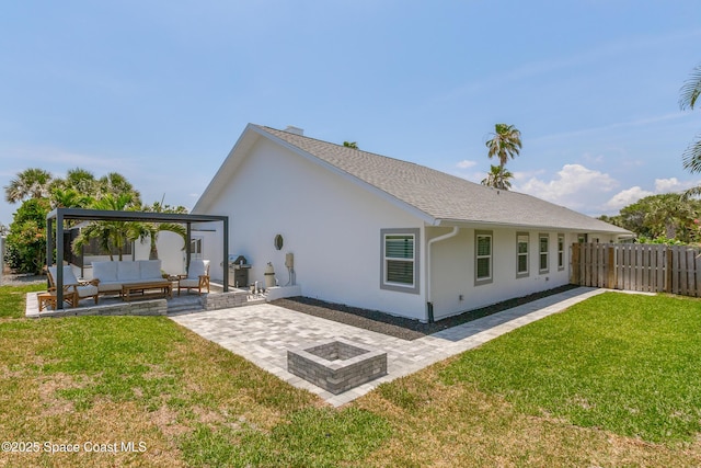 100 Martesia Way, Indian Harbour Beach, FL 32937 - back of house featuring an outdoor living space with a fire pit, a patio, and stucco siding