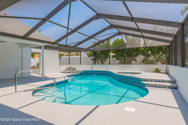 100 Martesia Way, Indian Harbour Beach, FL 32937 - swimming pool featuring an in-ground hot tub and a patio