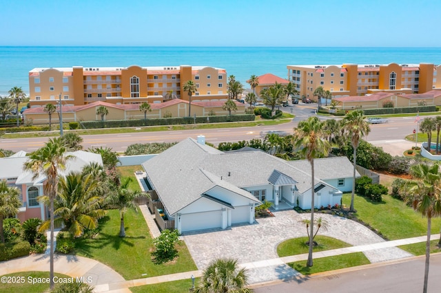 100 Martesia Way, Indian Harbour Beach, FL 32937 - aerial view of property and surrounding area with a nearby body of water