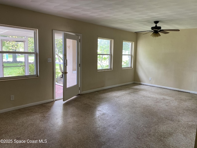 701 Lund Cir, Melbourne, FL 32901 - unfurnished room featuring baseboards and a ceiling fan