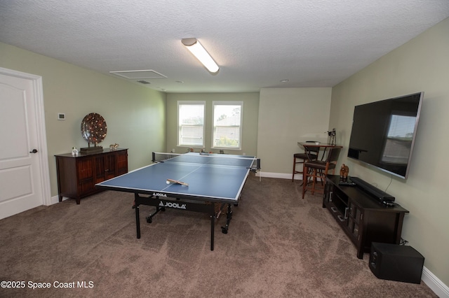 4407 Preservation Cir, Melbourne, FL 32934 - playroom featuring carpet, a textured ceiling, and baseboards