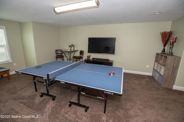 4407 Preservation Cir, Melbourne, FL 32934 - rec room with carpet floors, a textured ceiling, and baseboards