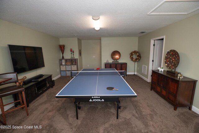 4407 Preservation Cir, Melbourne, FL 32934 - recreation room featuring carpet floors, a textured ceiling, and baseboards