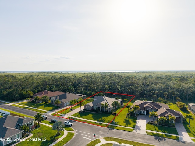 4407 Preservation Cir, Melbourne, FL 32934 - aerial view of residential area with a forest and property boundaries highlighted