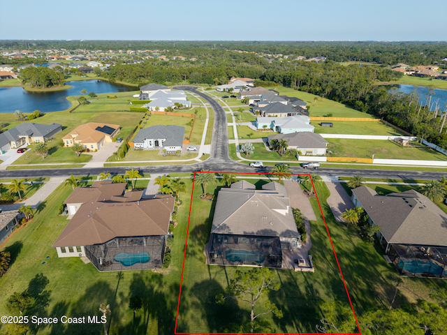 4407 Preservation Cir, Melbourne, FL 32934 - aerial perspective of suburban area with a nearby body of water and property parcel outlined