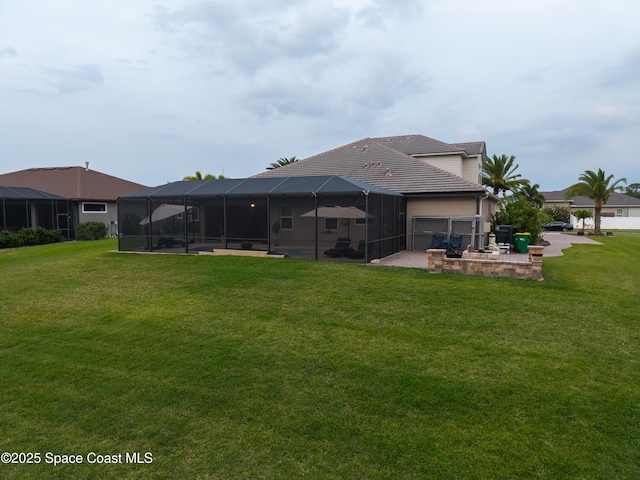 4407 Preservation Cir, Melbourne, FL 32934 - rear view of house with a patio area, a yard, and glass enclosure
