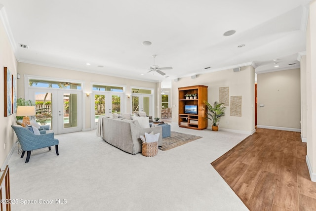 430 Monaco Dr, Indialantic, FL 32903 - living area with french doors, ornamental molding, a ceiling fan, recessed lighting, and baseboards