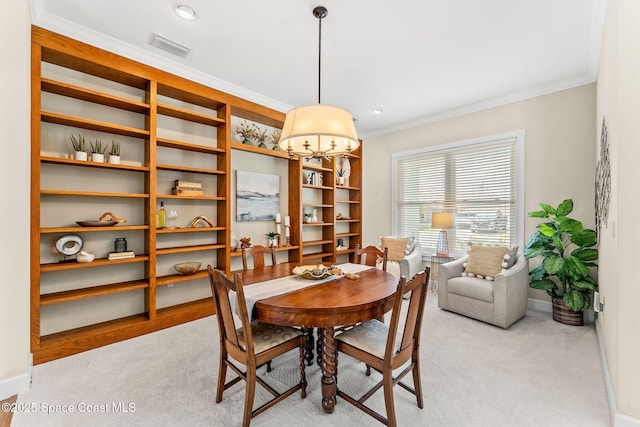 430 Monaco Dr, Indialantic, FL 32903 - dining room with crown molding, a chandelier, light carpet, baseboards, and recessed lighting