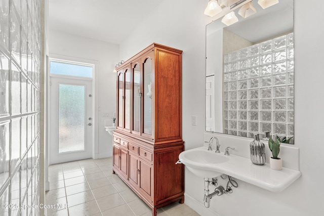 430 Monaco Dr, Indialantic, FL 32903 - bathroom with tile patterned floors and a sink
