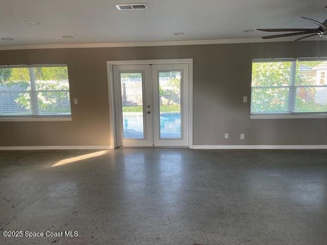unfurnished room with baseboards, healthy amount of natural light, french doors, and ornamental molding
