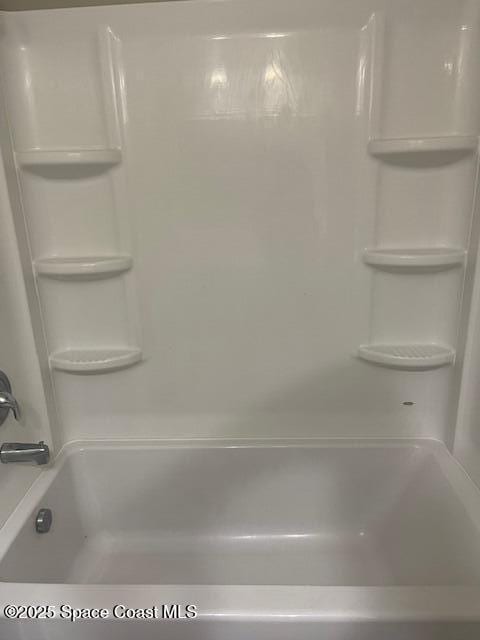 bathroom featuring bathtub / shower combination