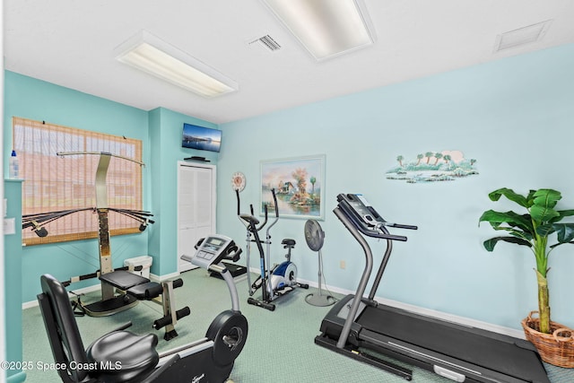343 N Tropical Trl Unit 404, Merritt Island, FL 32953 - workout area with baseboards