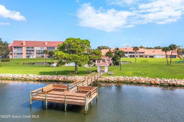 343 N Tropical Trl Unit 404, Merritt Island, FL 32953 - dock featuring a water view, a yard, and a gazebo