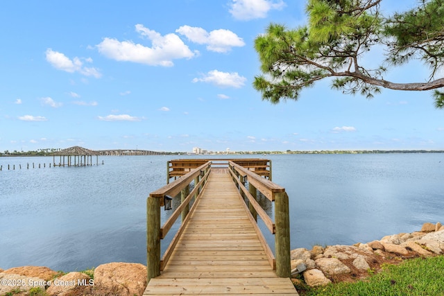 343 N Tropical Trl Unit 404, Merritt Island, FL 32953 - dock featuring a water view