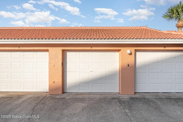 343 N Tropical Trl Unit 404, Merritt Island, FL 32953 - view of garage