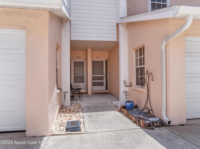 165 Escambia Ln Unit 502, Cocoa Beach, FL 32931 - entrance to property featuring stucco siding