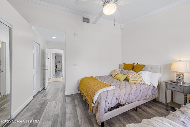 165 Escambia Ln Unit 502, Cocoa Beach, FL 32931 - bedroom featuring wood finished floors, ornamental molding, baseboards, recessed lighting, and ceiling fan