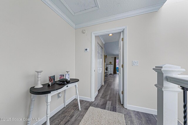 165 Escambia Ln Unit 502, Cocoa Beach, FL 32931 - hallway with ornamental molding, dark wood finished floors, and baseboards