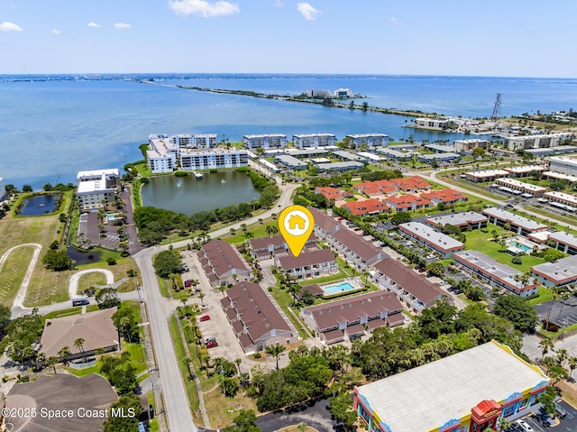 165 Escambia Ln Unit 502, Cocoa Beach, FL 32931 - drone / aerial view of a large body of water and apartment complex / building