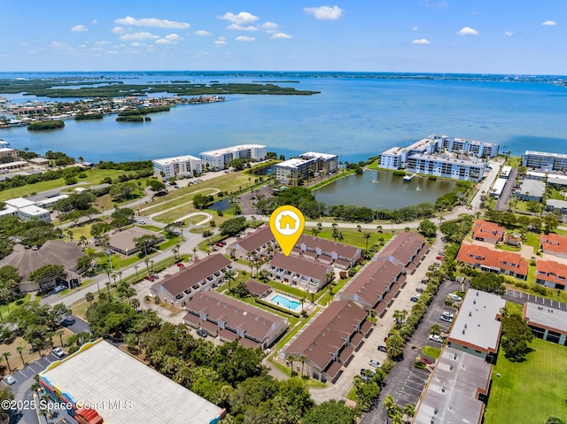 165 Escambia Ln Unit 502, Cocoa Beach, FL 32931 - bird's eye view of a large body of water and apartment complex