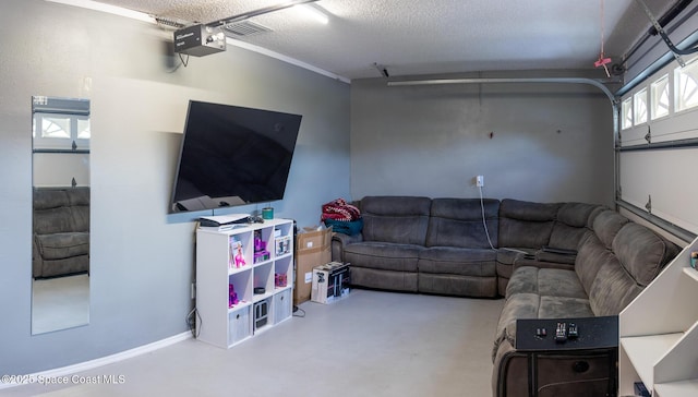 886 Spirea Dr, Rockledge, FL 32955 - living area featuring a garage, a textured ceiling, and finished concrete floors