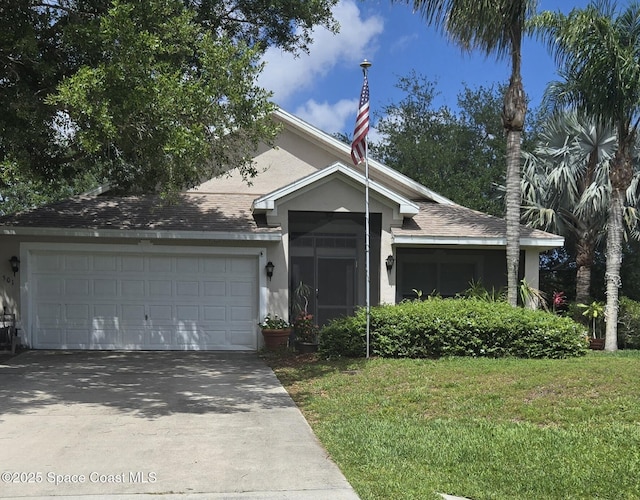 501 Lanfair Ave, Sebastian, FL 32958 - ranch-style house with driveway, a garage, stucco siding, a front lawn, and roof with shingles