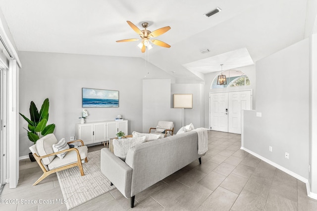 2102 Durban Ct, Rockledge, FL 32955 - living room featuring a ceiling fan, lofted ceiling, and baseboards