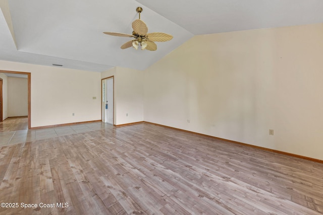 747 Greenwood Manor Cir Unit 17-A, West Melbourne, FL 32904 - empty room with ceiling fan, light wood-style flooring, and vaulted ceiling
