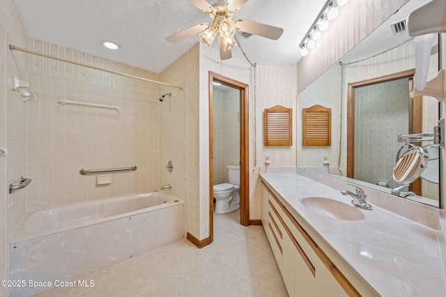 747 Greenwood Manor Cir Unit 17-A, West Melbourne, FL 32904 - bathroom featuring tile patterned flooring, bathtub / shower combination, vanity, ceiling fan, and a textured ceiling