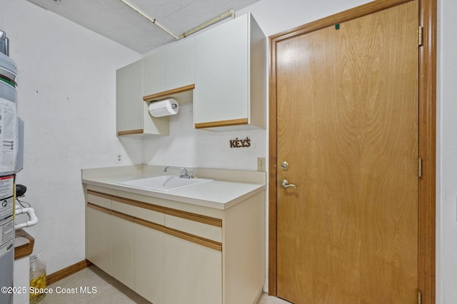 747 Greenwood Manor Cir Unit 17-A, West Melbourne, FL 32904 - kitchen featuring a sink and light countertops