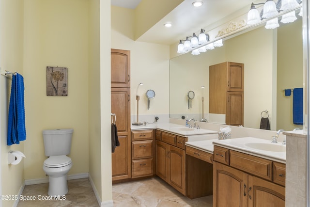 1035 Quail Ct SW, Vero Beach, FL 32968 - full bathroom with toilet, double vanity, recessed lighting, tile patterned flooring, and baseboards