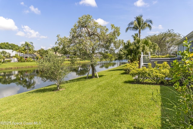1035 Quail Ct SW, Vero Beach, FL 32968 - view of grassy yard featuring a water view