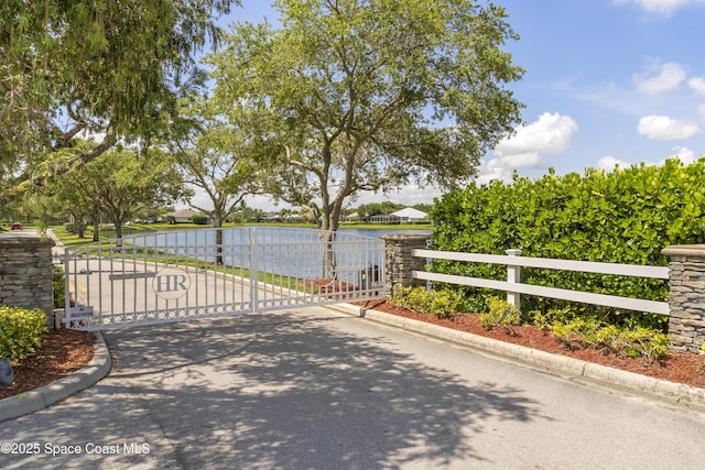 1035 Quail Ct SW, Vero Beach, FL 32968 - gate featuring a water view