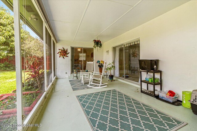 306 Glen Ridge Rd, Cocoa, FL 32926 - sunroom with finished concrete floors