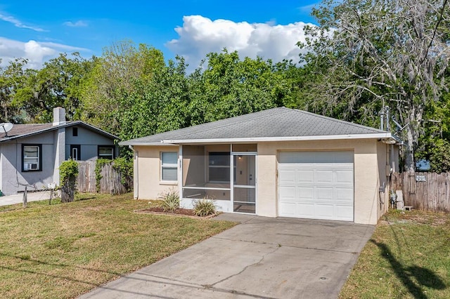 517 Fulton St, Daytona Beach, FL 32114 - ranch-style house with stucco siding, a garage, concrete driveway, and a sunroom