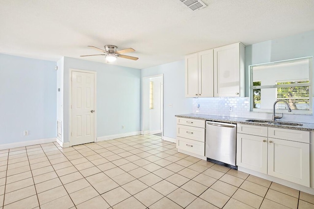 517 Fulton St, Daytona Beach, FL 32114 - kitchen with a sink, stainless steel dishwasher, light stone countertops, ceiling fan, and tasteful backsplash