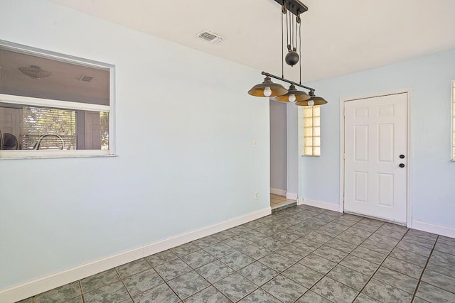 517 Fulton St, Daytona Beach, FL 32114 - unfurnished dining area with baseboards