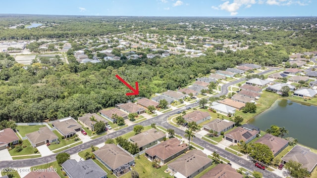 122 Port Royal Cir, Sebastian, FL 32958 - aerial view of property and surrounding area with a large body of water and nearby suburban area