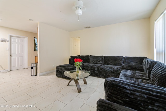 1049 Azalea Ln, Cocoa, FL 32922 - living room featuring a ceiling fan