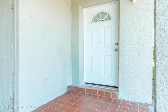 1049 Azalea Ln, Cocoa, FL 32922 - property entrance featuring stucco siding