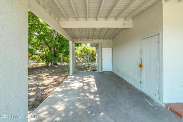 1049 Azalea Ln, Cocoa, FL 32922 - view of patio with a carport