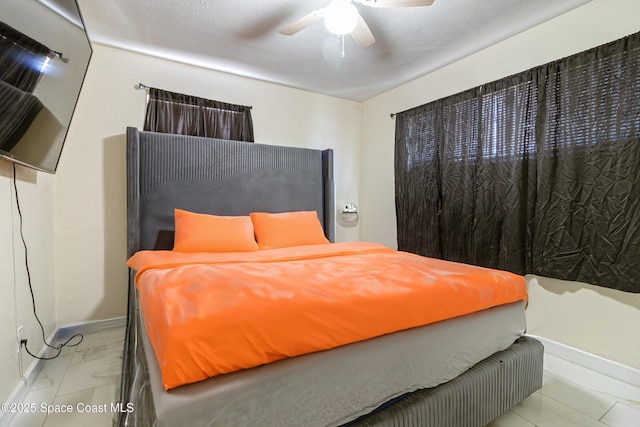 1049 Azalea Ln, Cocoa, FL 32922 - bedroom with marble look tiles, baseboards, and ceiling fan
