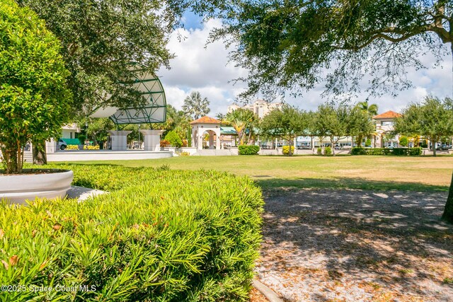1049 Azalea Ln, Cocoa, FL 32922 - view of property's community with a yard