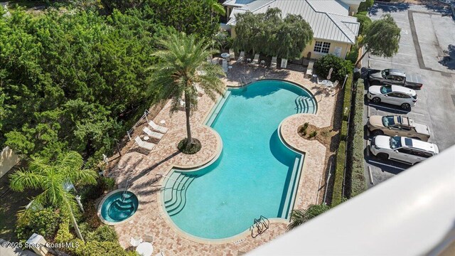 480 Sail Ln Unit 607, Merritt Island, FL 32953 - community pool with a patio area